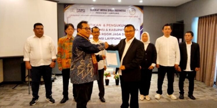 Ketua Umum SMSI Kukuhkan Pokja Newsroom Jaga Desa di Lampung Ikhtiar Menyumbat Kebocoran Dana Desa